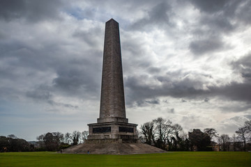 Fototapeta na wymiar Dublin, Ireland – March 2019. Wellington Monument Imposing 62m obelisk built to commemorate victories of Arthur Wellesley, 1st Duke of Wellington. in Dublin, Ireland
