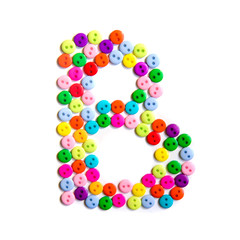Letter B of the English alphabet made of multi-colored buttons