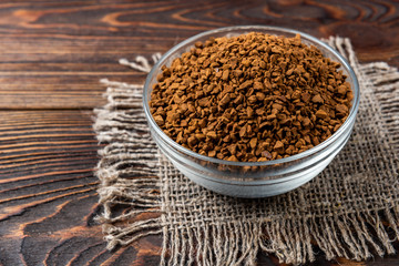 Coffee on dark wooden background.