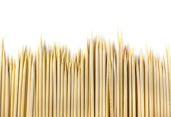 wooden skewers on white background