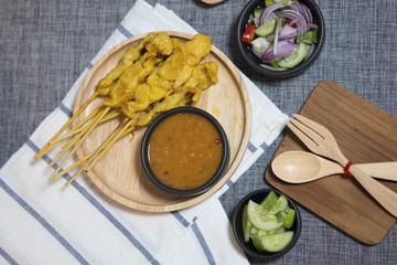 Grilled pork satay with peanut sauce