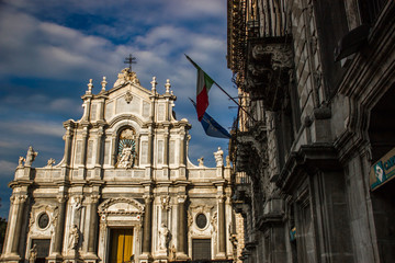Catania cathedral front view with baroque architecture building and dome
