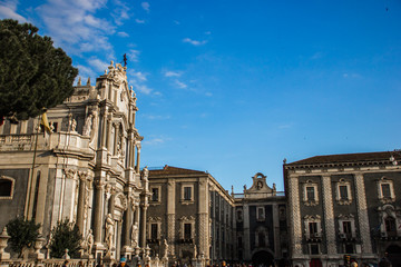 Catania cathedral square, side view church and baroque architecture building