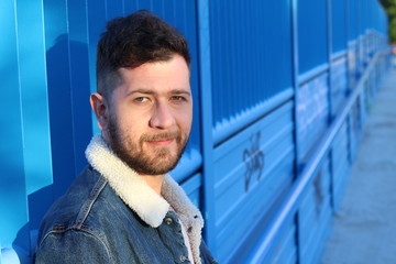 Candid of Caucasian man looking at camera 