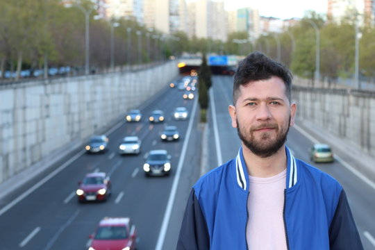 Candid of man with highway in the background