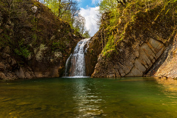Fototapeta premium Beauty spring long exposure view on a waterfall 
