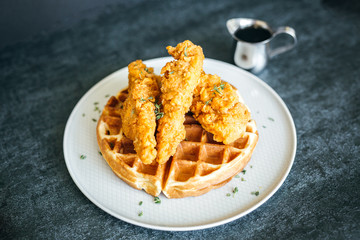 Chicken and Waffles on Dark Background
