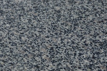 gray black stone texture from a piece of marble wall