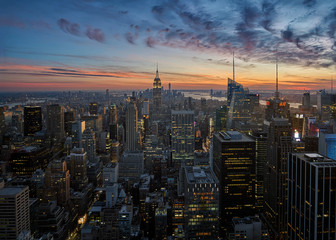 Sunset view over New York City with landmarks as the freedom tower and empire state building 