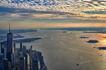 Aerial of the upper new york bay looking south towards the statue of liberty and Verrazzano bridge