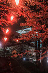 春のライトアップされた久保田城跡の御隅櫓の風景