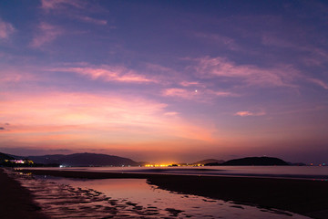 Venus in the morning sky, dawn and low tide on Hainan Island, China