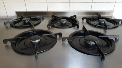 Gas stove with five rings in the kitchen