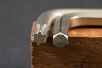 hexagonal and star wrenches, called Allen and torx wrenches