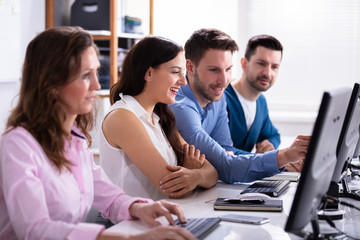Businessman Pointing On Computer Screen