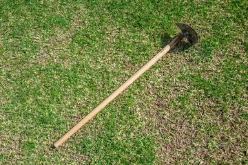Gardening Tools on grass green background.