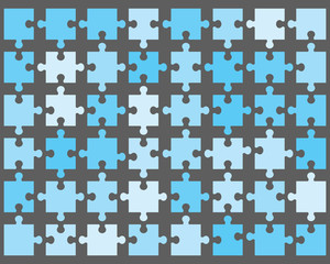 Colorful shiny puzzle on a gray background, separate pieces