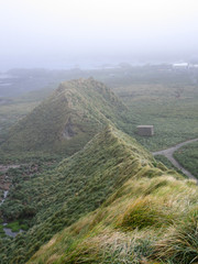 View from viewpoint on Macquarie island, a remote island in the subantarctic region of Australia in the southern pacific ocean. The permanent Macquarie Island research Station is in the background.