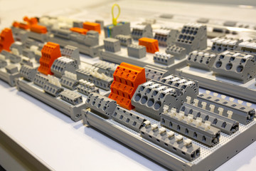 Terminals, contactors, relays, switches on the stand. Electrical components