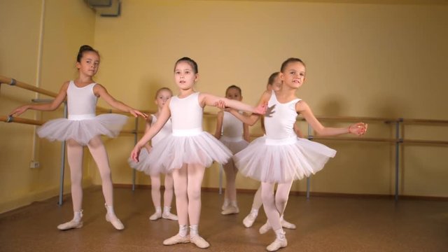 Little girls dance ballet. Children in ballet class