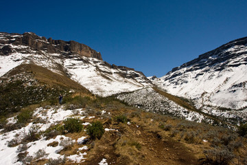 Landscape of Sani Pass, Drakensbergen in South-Africa. After rare snow storm.