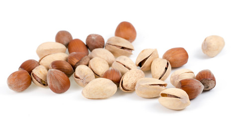 pistachios, hazelnuts on a white background