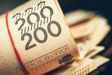 Roll of Polish Zloty Banknotes - obrazy, fototapety, plakaty