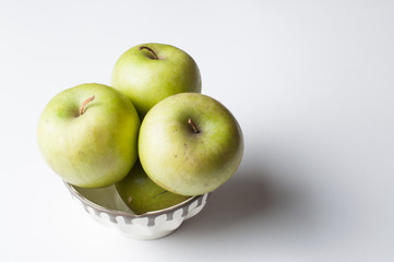 Green apple isolated on a white background.Apple peeling