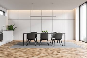 White kitchen interior with table