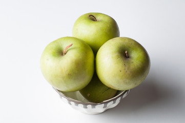 Green apple isolated on a white background.Apple peeling