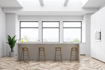 White kitchen interior, cupboard and bar