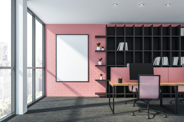 Pink brick office workplace with poster