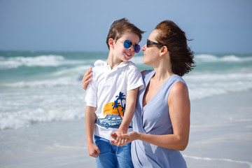 Mother and son on tropical beach, Florida