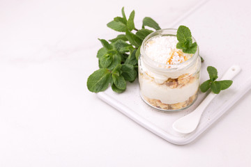 Coconut bisquit dessert with ricotta, mint. Yogurt breakfast