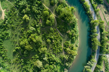 Road, river and forest aerial view. Picture taken with a drone.