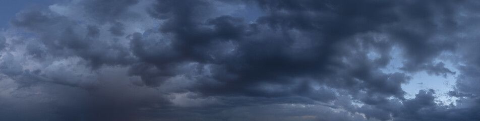 Fototapeta na wymiar clouds at sunset, evening time. Panorama