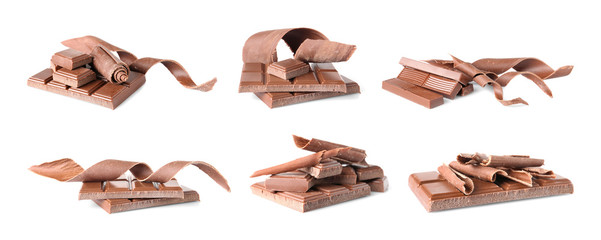 Set of delicious chocolate pieces and curls on white background