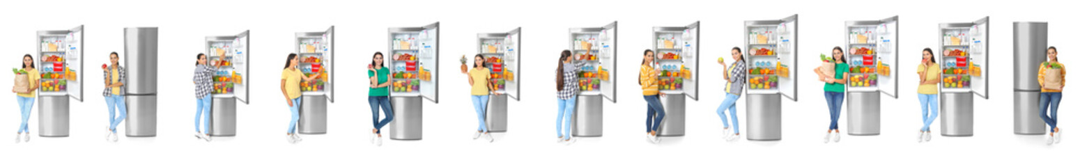 Young man near open refrigerator on white background