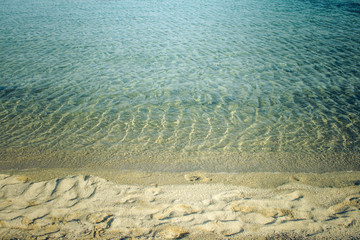 summer vacation beach wallpaper simple background scenic landscape of sand and water, empty copy space for text, tourist agency pattern