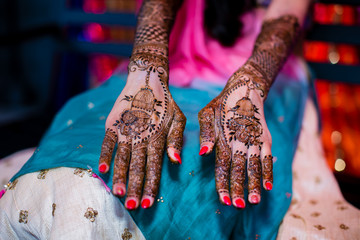 Indian bride's henna mehndi mehendi hands close up