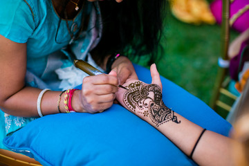 Indian bride's henna mehendi mendi hands close up