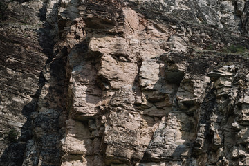 Image of a human face forged by nature on a stone. Sulak Canyon, Dagestan