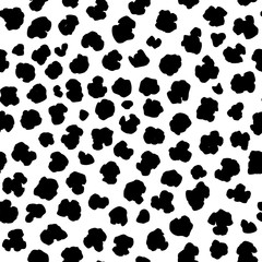Seamless animalistic pattern, leopard or dalmatian skin, spotted pattern