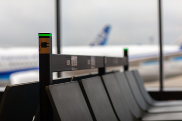 Empty seat in the airport terminal lounge.