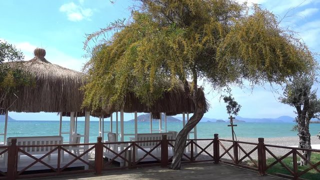 4K Zoom out beautiful sea view with empty modern beach