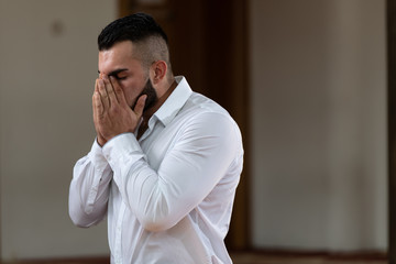 Young Business Man Muslim Praying