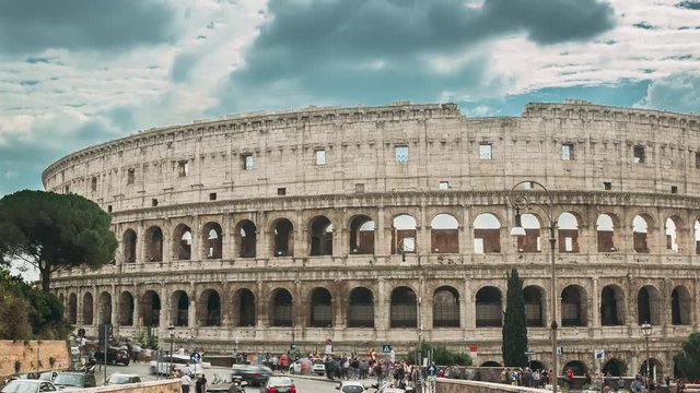 Rome, Italy. Colosseum. Traffic Near Flavian Amphitheatre. Famous World Landmark UNESCO.