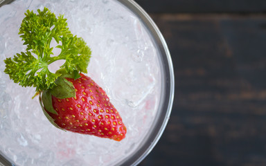 Red Italian Soda Cold Beverage and Strawberry Fruit and Parsley Flatlay Half