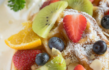 Strawberry Blueberry Kiwi Lemon Waffle Whipped Cream Dessert Close Up