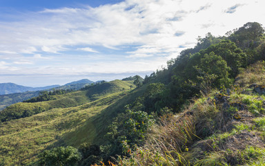3 Green Tree Mountain with Warm Sun Light and Blue Sky Cloud at Phu Langka National Park Wide